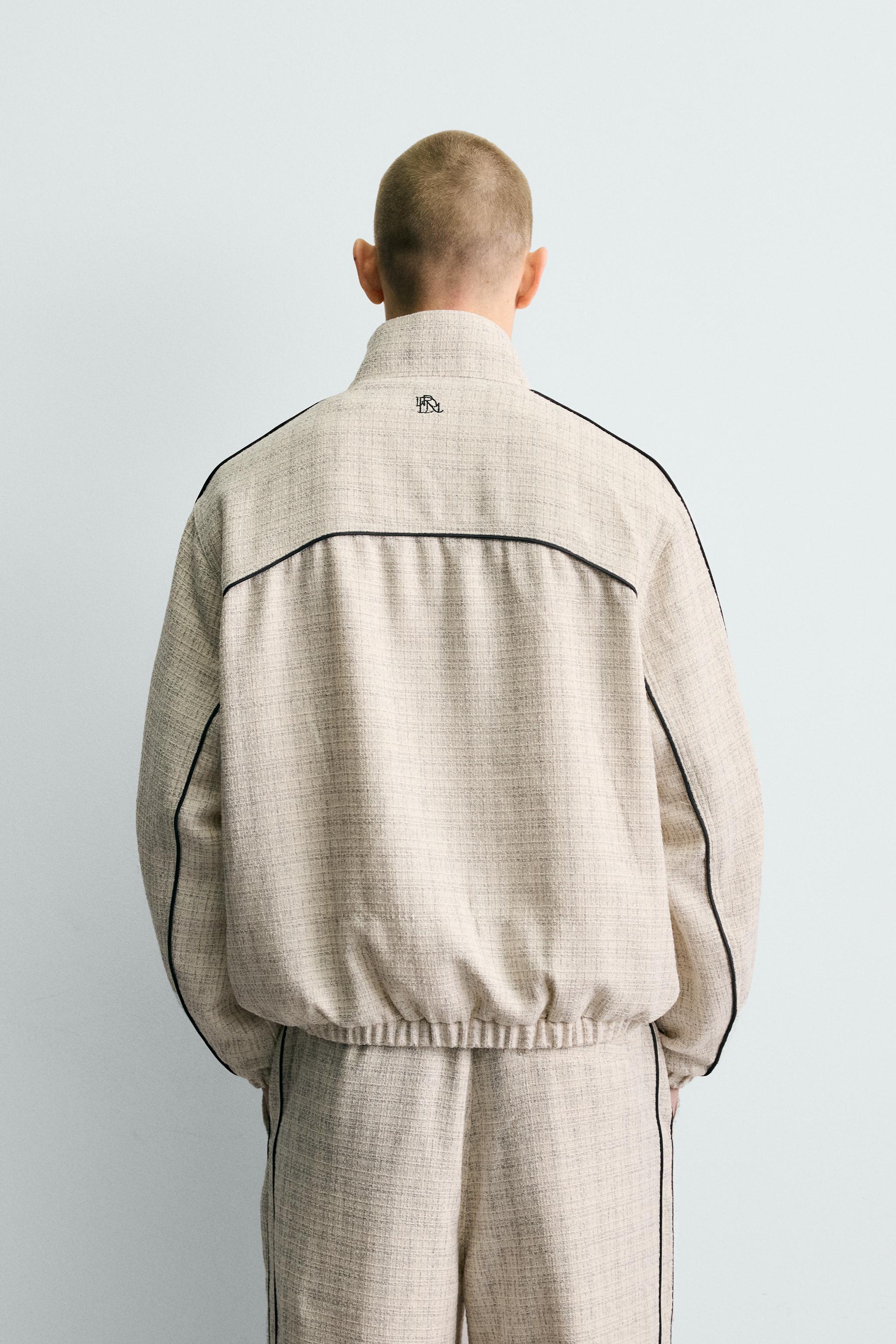BLOUSON COUPE CARRÉE STRUCTURÉ LISERÉS CONTRASTANTS